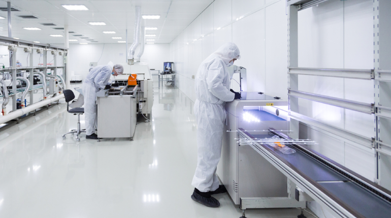 Image of a semiconductor lithography machine in a cleanroom