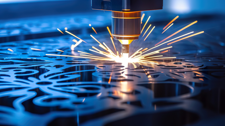 Close-up of metal being cut by a 3D laser cutter